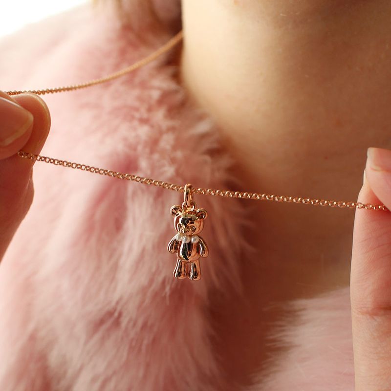 noonoobear with pearl necklace