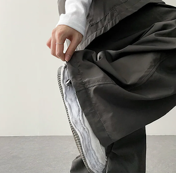 Log banding layered pocket skirt pants