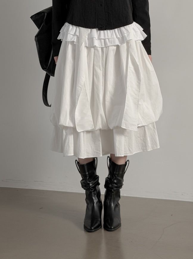 mnem（ムネム）の「Lilum Balloon Tiered Midi Skirt（Skirts）」