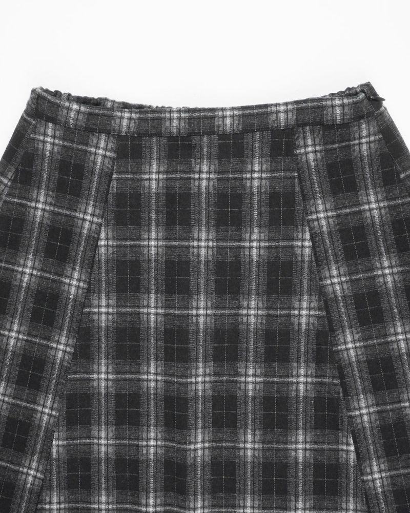 A BLACK CHECK SKIRT