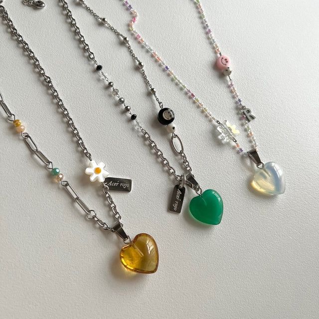Acer rojo(アセルロジョ)の「3 Color Kitchee Heart Smile Initial Handmade Beads Necklace (choose 3 types)(Accessories)」