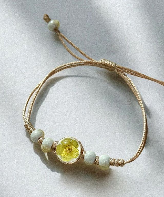 Adamdree(アダムドリー)の「yellow flower bracelet(Accessories)」