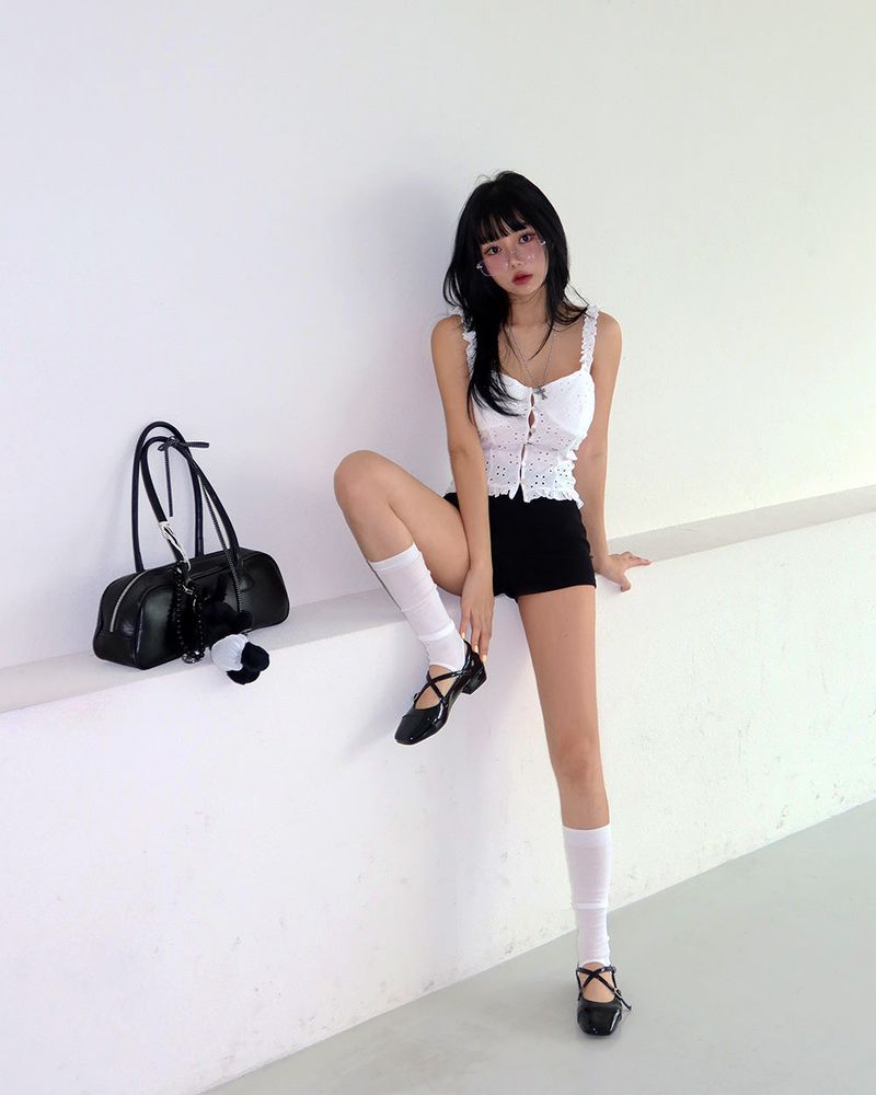 a punching eyelet bustier blouse