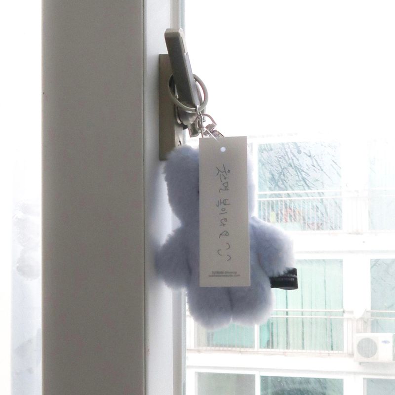 tuteogi smile doll keyring