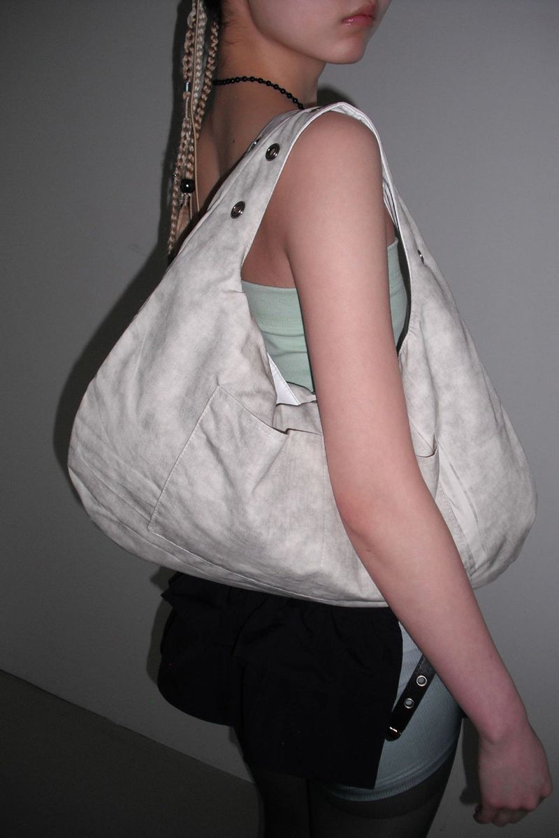 DEPC（デプク）の「EYELET LEATHER BAG -WHITE（Bags）」