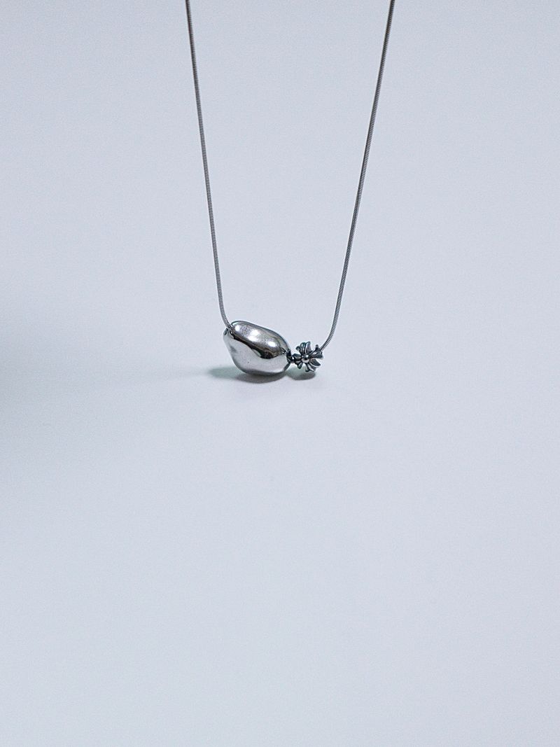 All surgical steel object cross necklace