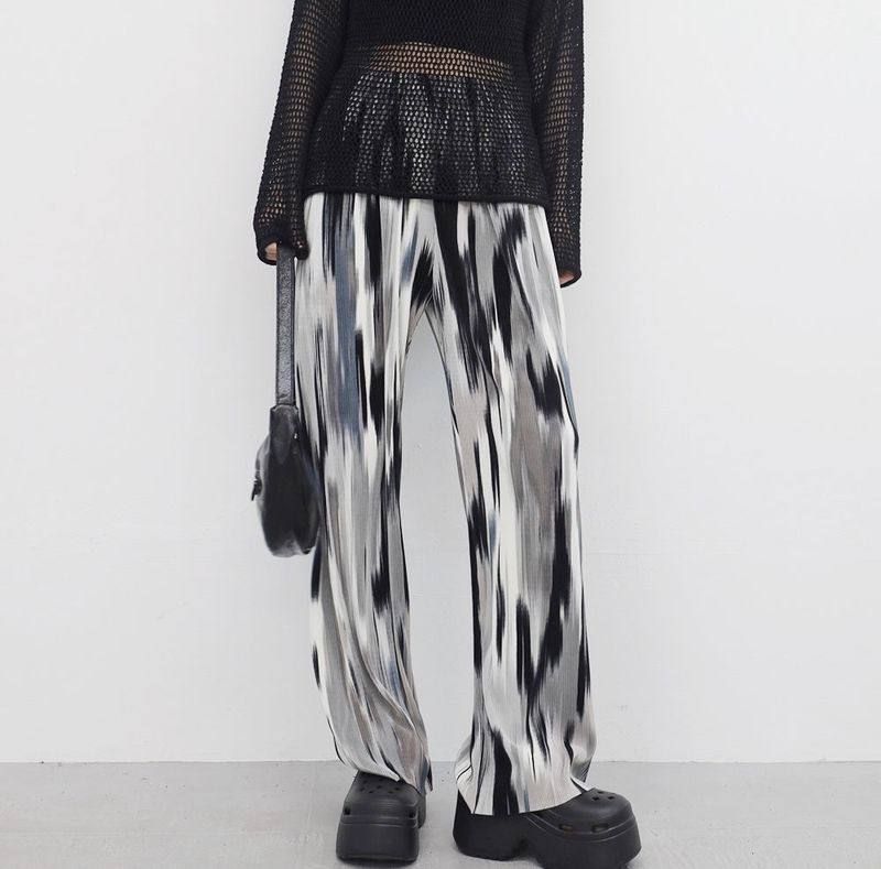 yellow-colored patterned pants