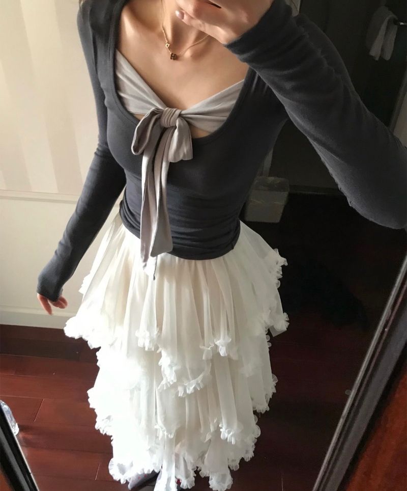 cloudemotion(クラウドエモーション)の「nouz ribbon deep slim top(Tops)」