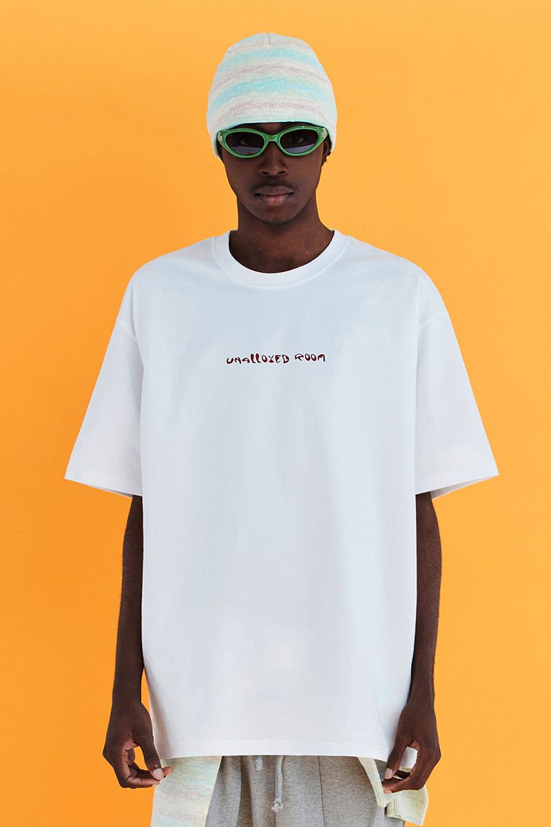 UNALLOYED(アナロイド)の「LOGO LEAF T SHIRT / WHITE(Tops)」