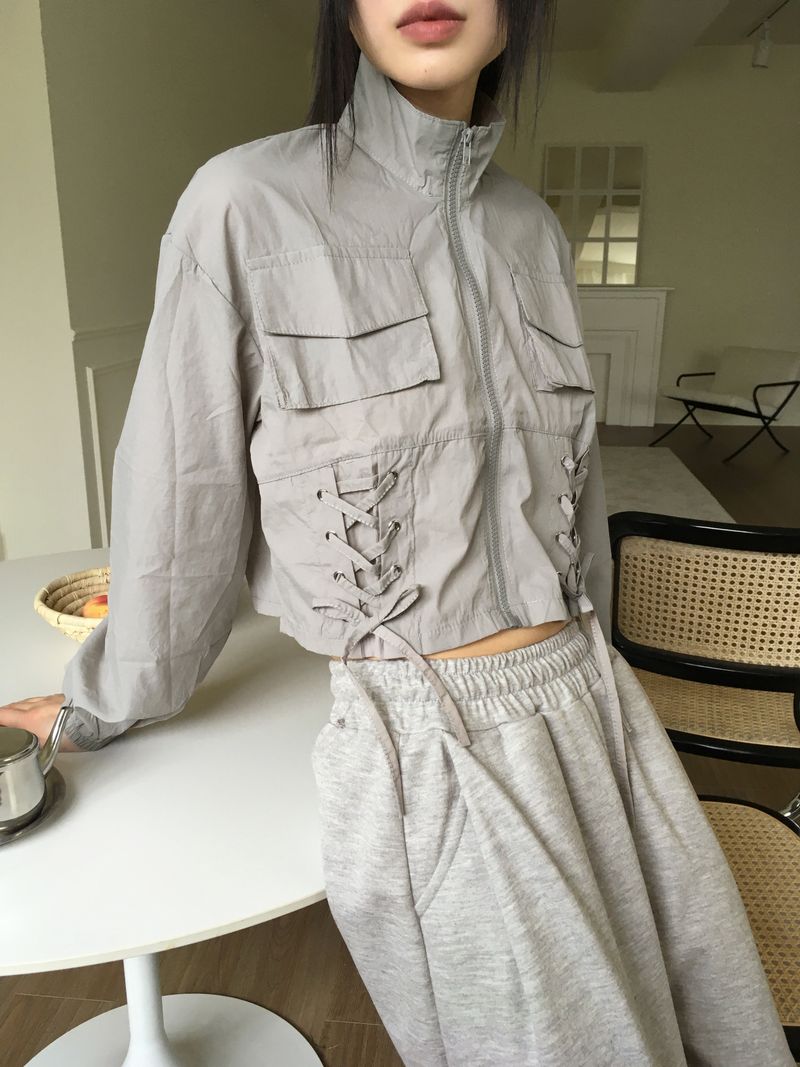 WONDER WONDER(ワンダーワンダー)の「Cult Nylon Strap Corset Cropped Windbreaker(Jackets/Outerwear)」