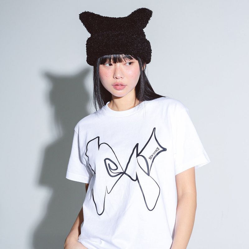 NEWKITSCH(ニューキッチジェネレーション)の「MIGNON LOGO HOLE GRAPHIC SHORT SLEEVE (WHITE)(Tops)」