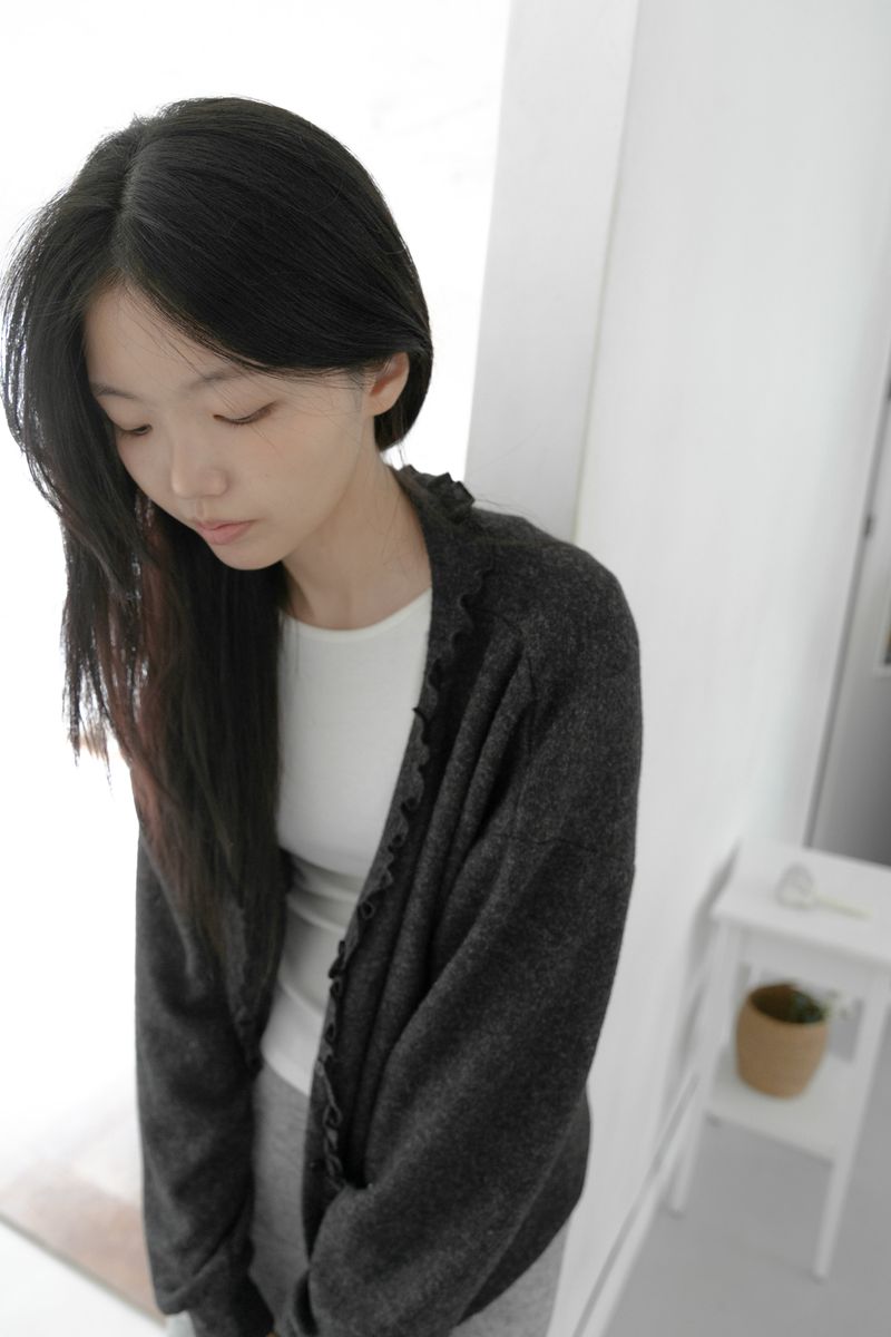 omoosoohy（オムスヒ）の「frill melange cardigan(3colors)（Tops）」