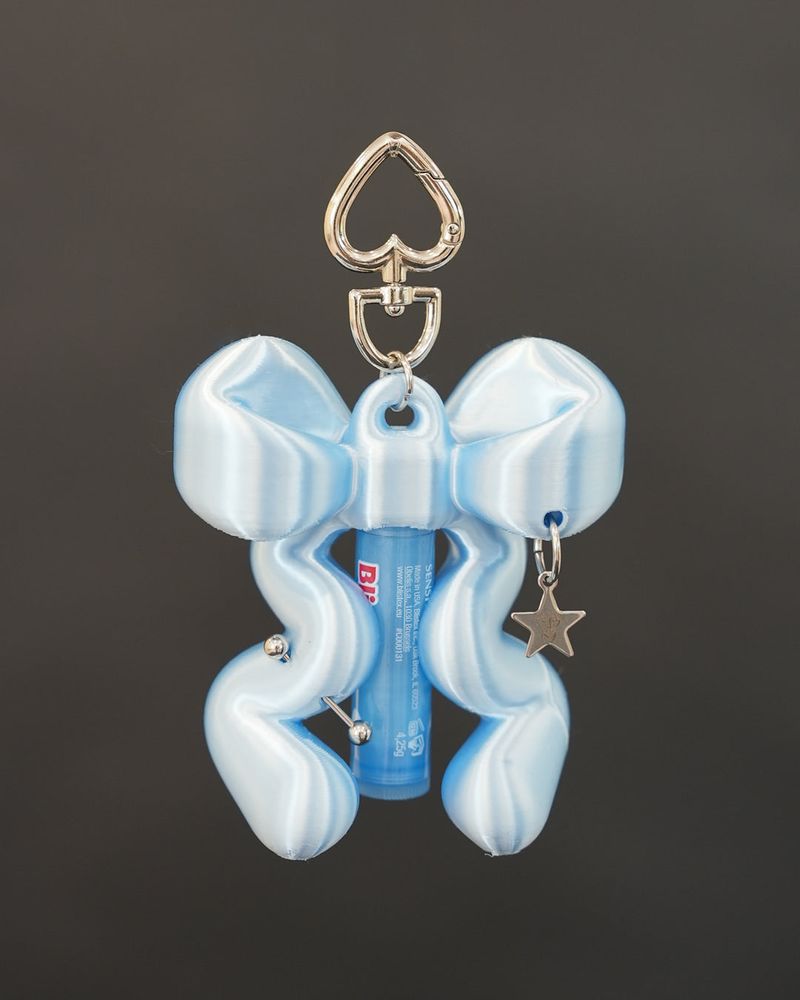 JIMI（ジミ）の「RIBBON BALM KEYCHAIN - Angelic Blue（Toys/Key Holders）」