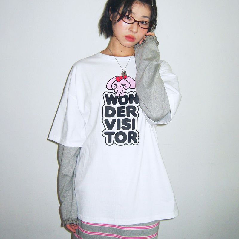 wonder visitor（ワンダービジター）の「PPINTO Logo Layered frill LS-T [white]（Tops）」