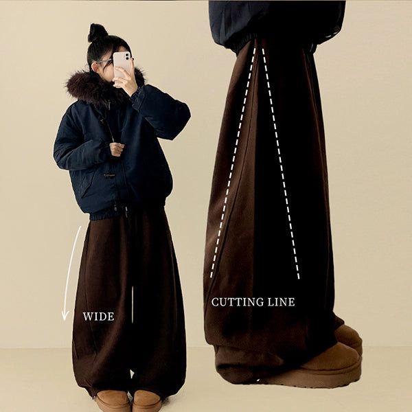 Mende Curved Incision Woolen Wide Pants
