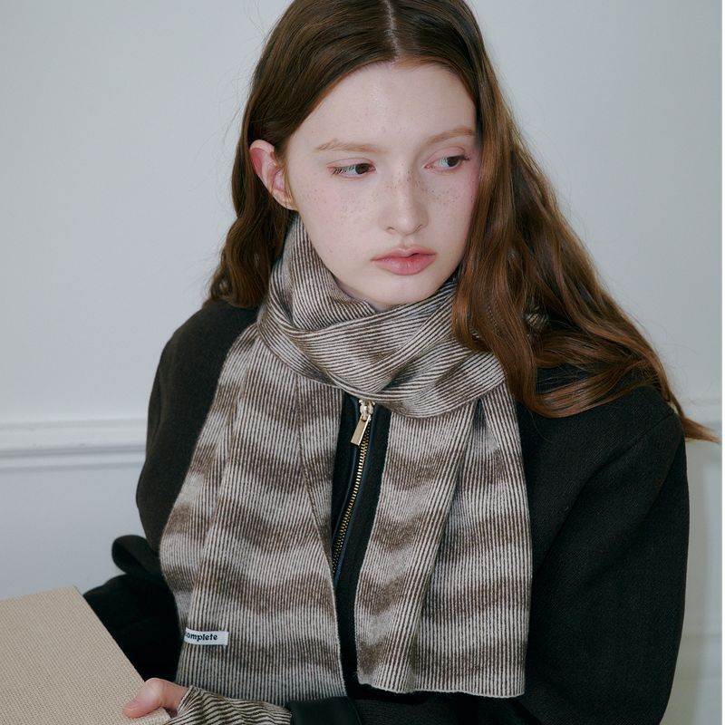 ALLINCOMPLETE(オールインコンプリート)の「Moire Wave Muffler (Brown)(Fashion Accessories)」