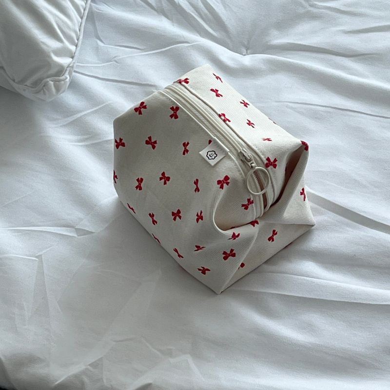 RED RIBBON ZIPPER POUCH