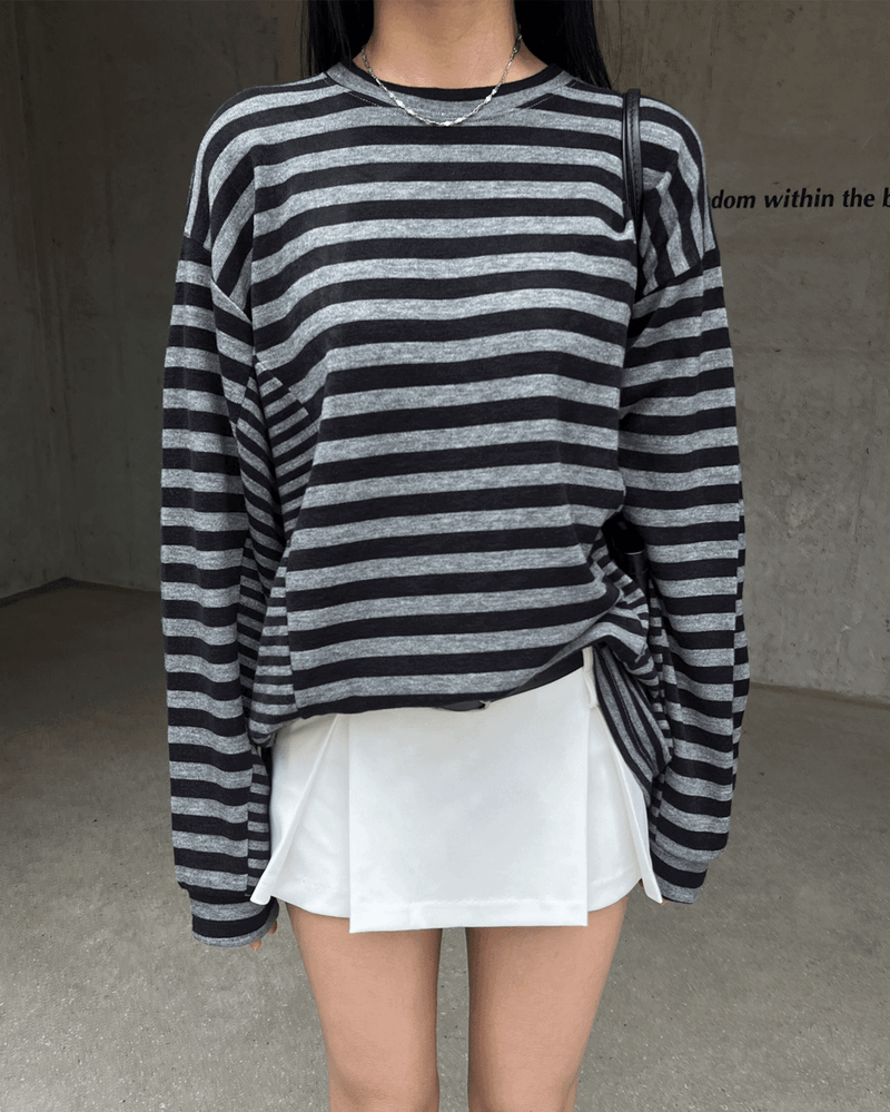 GUSTA（グスタ）の「Tender Flow Stripe Color Block Single-breasted Loose Fit Long Sleeve T-shirt (2 colors)（Tops）」