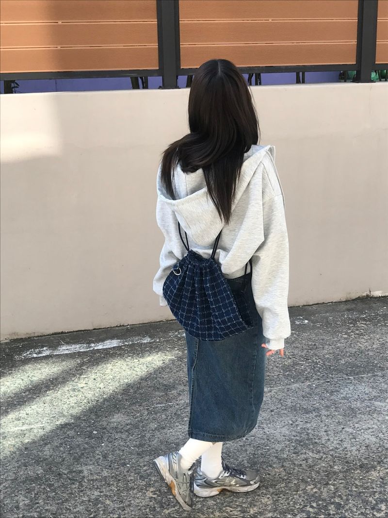 Juana washing long skirt