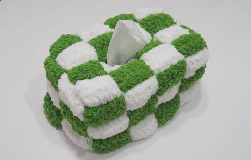 green checkerborad tissue case