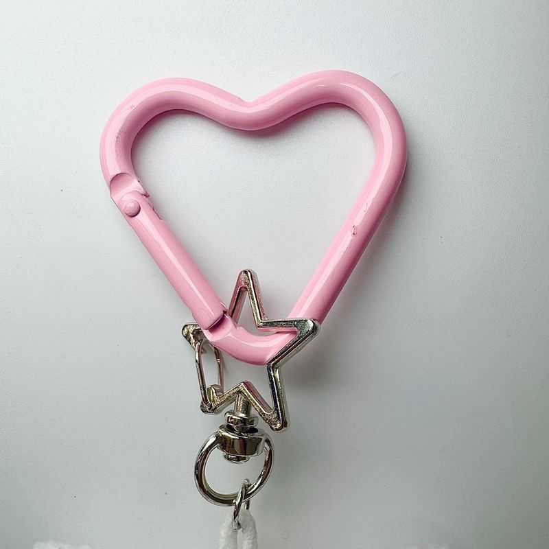Pierced pinky cow keychain