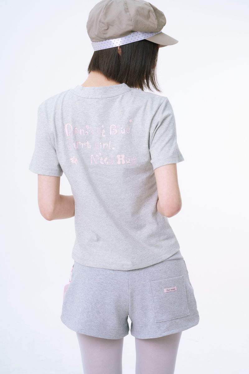 Innermuseum（インナーミュージアム）の「ドントビーブルーグリッターTシャツ (MELANGE GREY)（トップス）」