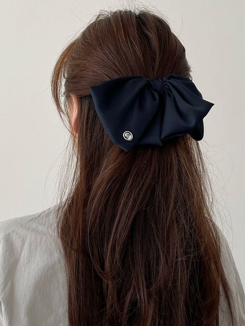oar（オーエーアール）の「カメオビッグラッフルリボンヘアバレッタ（ヘアアクセサリー）」