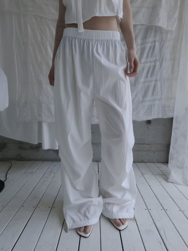 mnem（ムネム）の「Slow Pintuck Nylon Pants（Pants）」