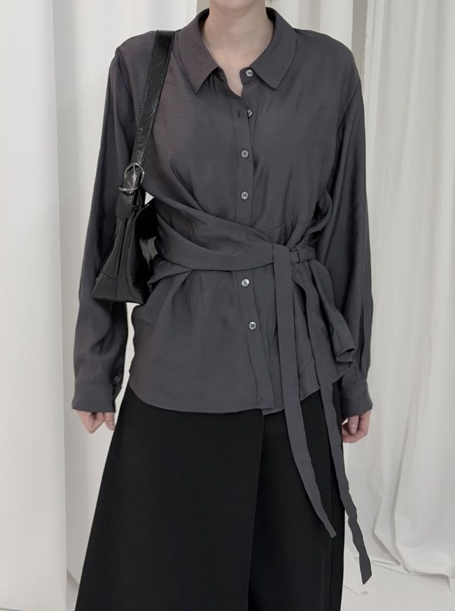 mnem（ムネム）の「Eryl Wrap Shirt Blouse（Tops）」