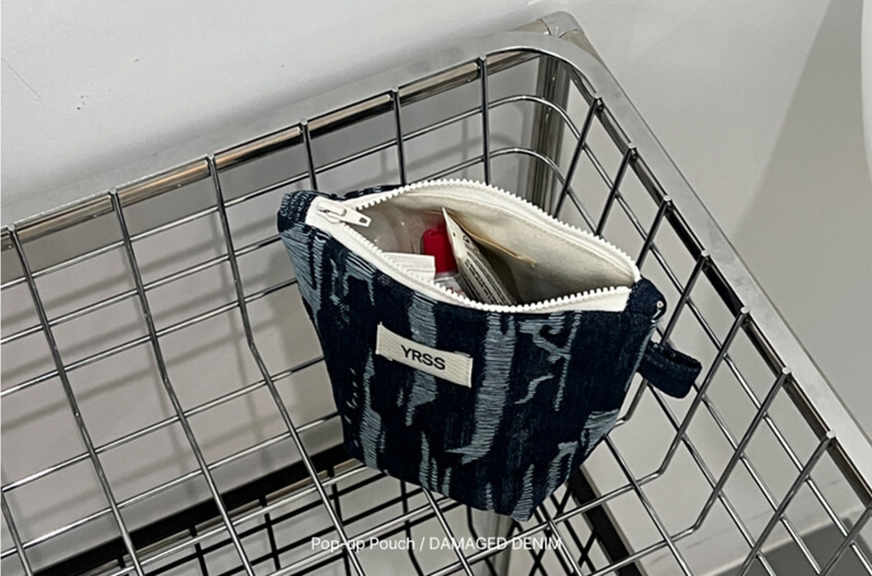 YRSS(イヤス)の「DAMAGED DENIM POUCH (POP-UP POUCH)(Smartphone Accessories)」