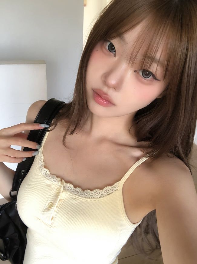 ヘミングリブレースボタンスリーブレストップ
