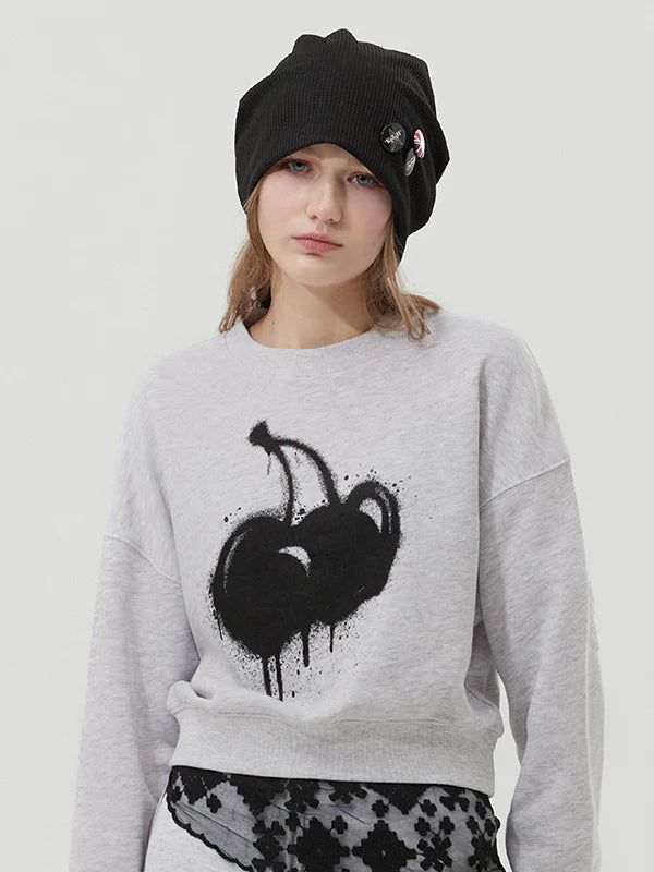 KIRSH（キルシー）の「MELTING CHERRY PRINTED CROP SWEATSHIRT - GRAY（Tops）」
