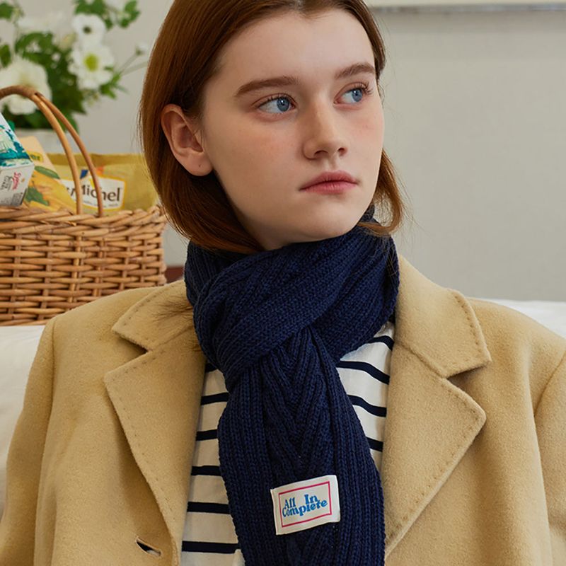 ALLINCOMPLETE（オールインコンプリート）の「Arrow Knit Mini Muffler (Navy)（Fashion Accessories）」