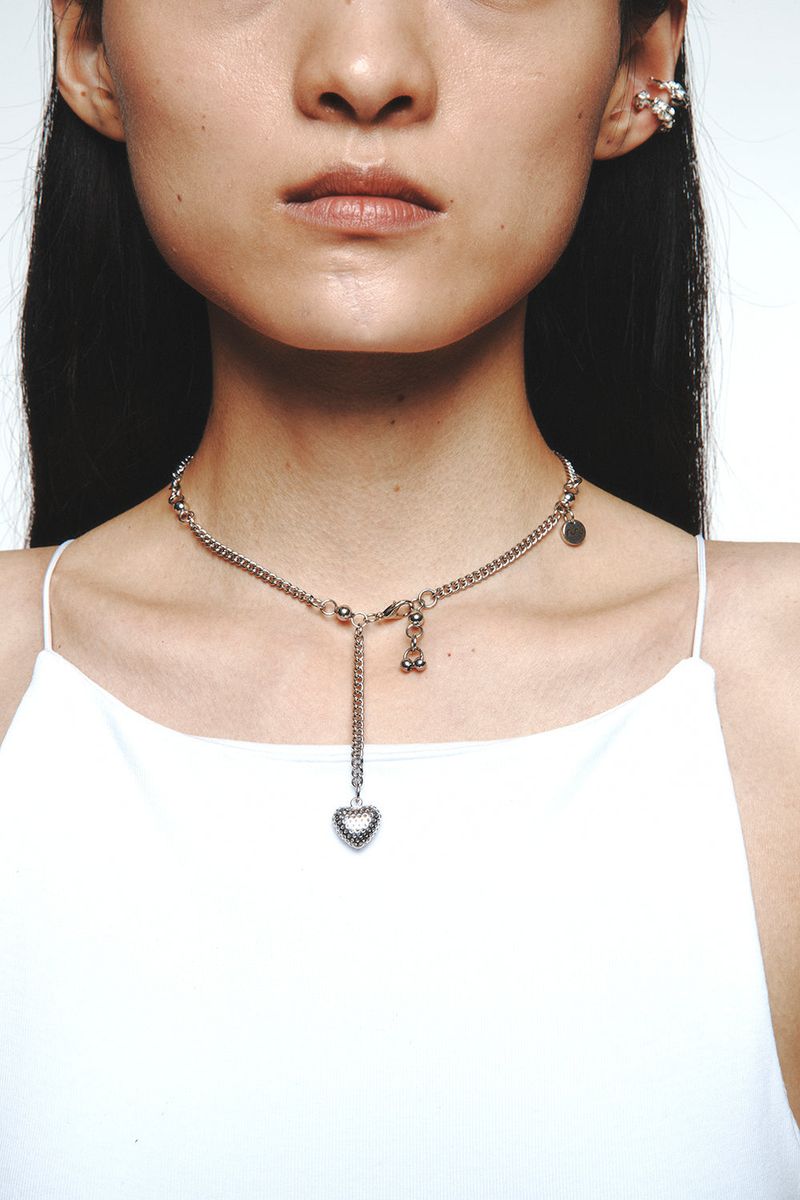 HEART PIERCING NECKLACE