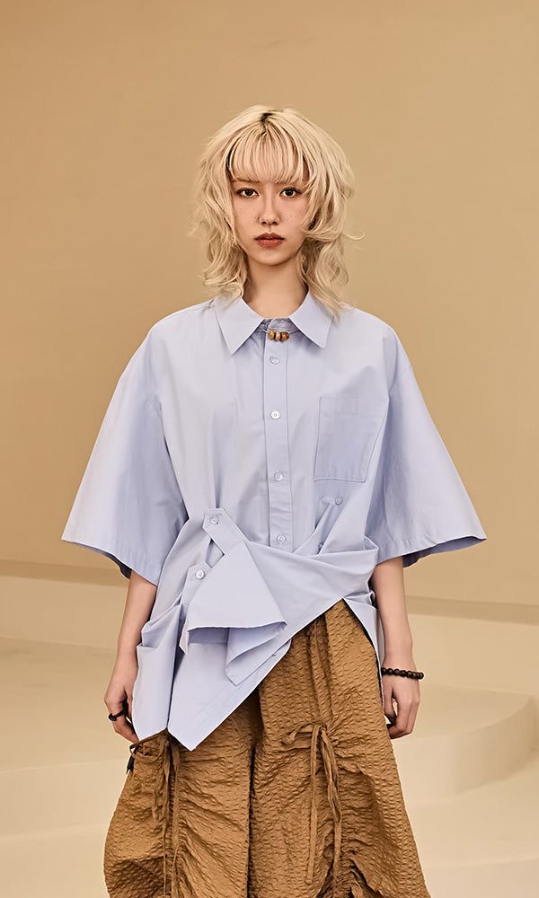Reculer（ルキュレ）の「ビジューポイントショートスリーブシャツ スカイブルー（トップス）」