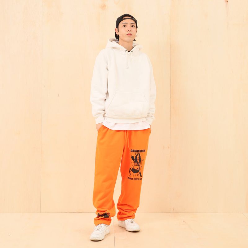 KRUCHI（クルチ）の「DANGEROUS SWEAT PANTS (ORANGE)（Pants）」