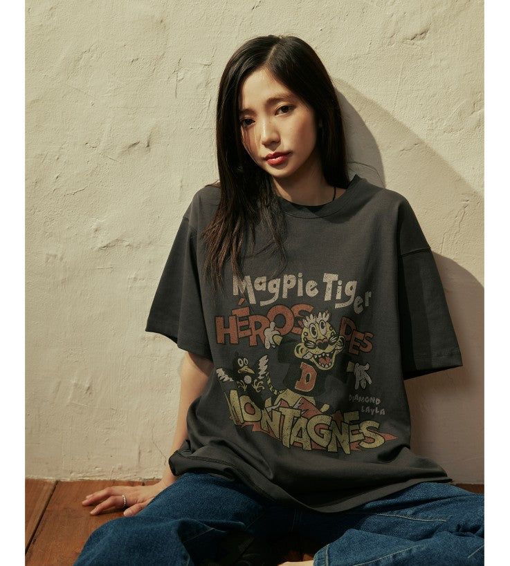 DIAMOND LAYLA（ダイアモンドレイラ）の「KKAHO ショータイム半袖Tシャツ T94 チャコール（トップス）」
