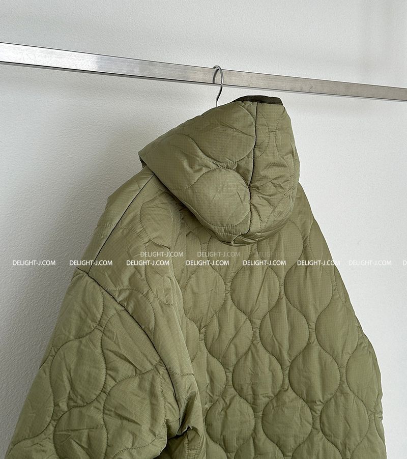 a quilted padded jacket with wool