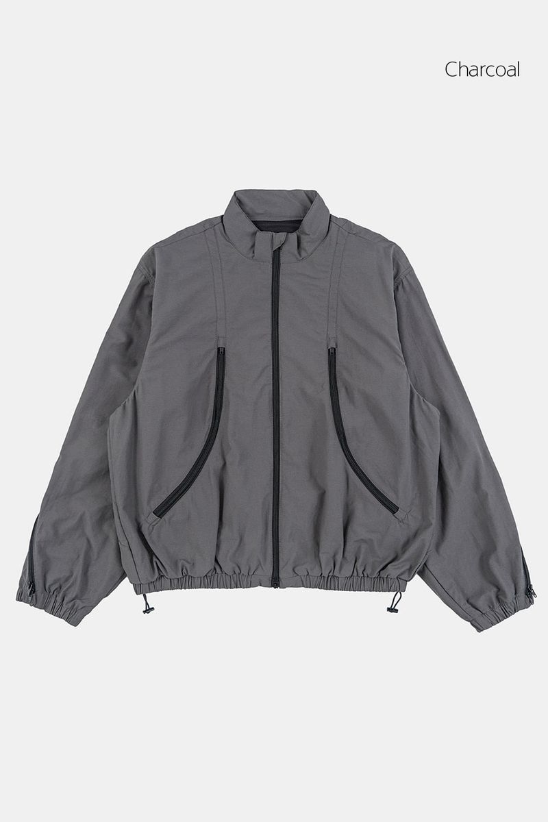 Multi curved line zip-up jumper
