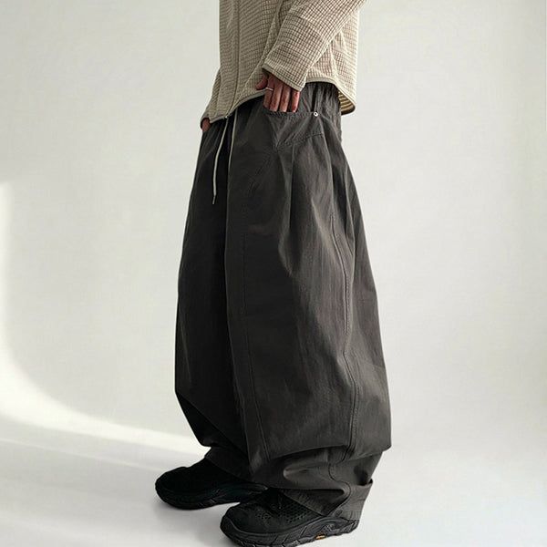 voarc（ボアク）の「Kurtz Waist Banding Curve Slit Pintuck Balloon Fit Rivet Cotton Wide Pants（Pants）」