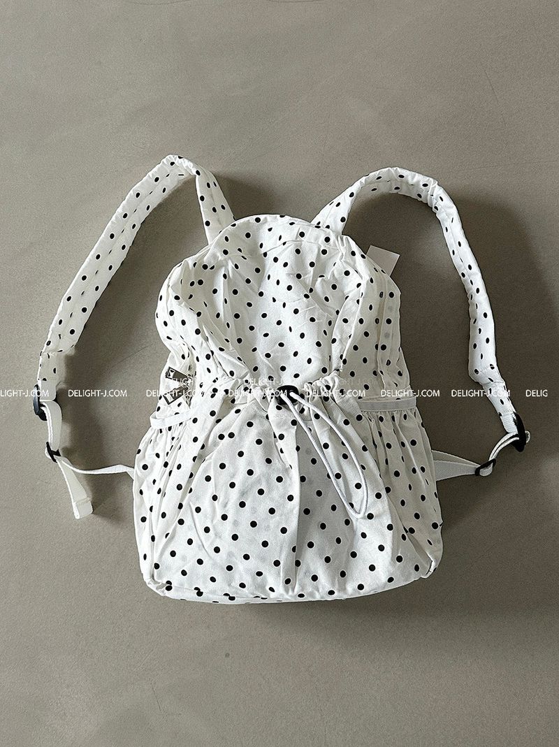 Dot dot string pocket backpack
