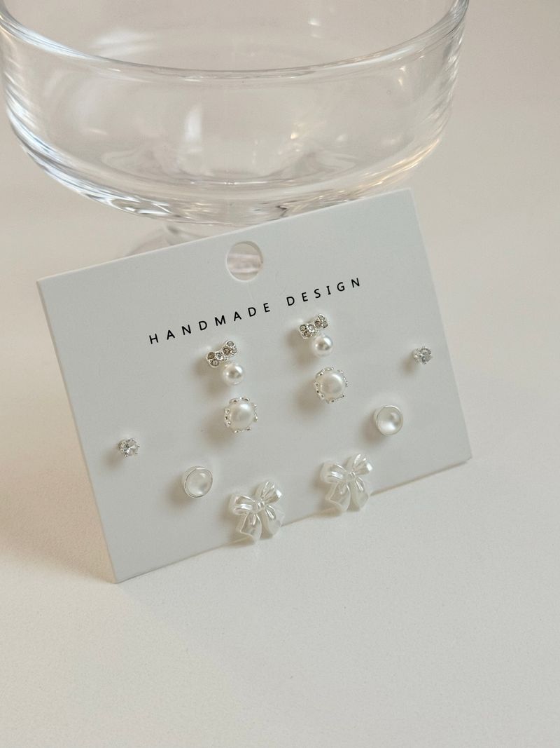 Blingmoon（ブリングムーン）の「[5 set] Pure Ribbon Earrings Set / 2 color / Daily Mini Cubic Wedding Pearl Simple（Accessories）」