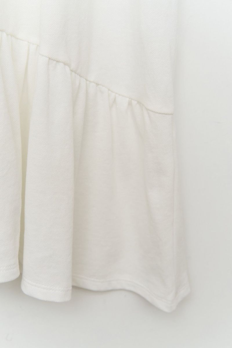 (W) Eke Unbalance Top