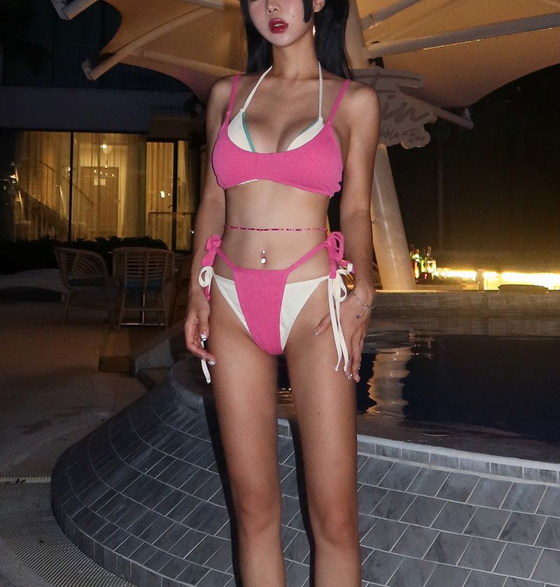 a set of 2 layered colored bikinis