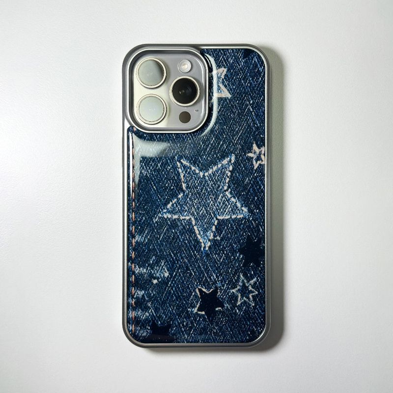 MEMORIESBOUNDARY(メモリーズバウンダリー)の「Faded Denim Stardust Phone Case Blue Indigo (SV_Epoxy)(Smartphone Accessories)」
