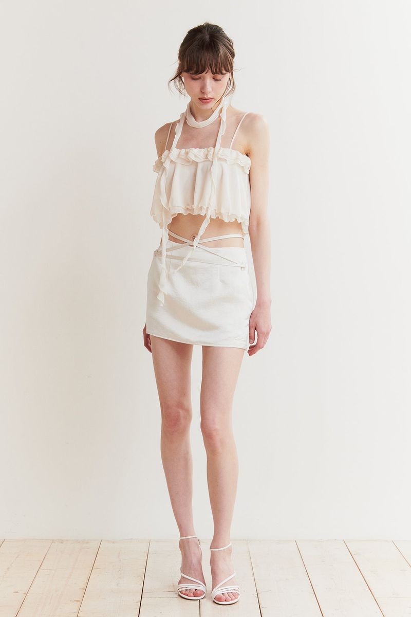PAIN OR PLEASURE（ペインオアプレジャー）の「JADE MINI SKIRT cream（Skirts）」