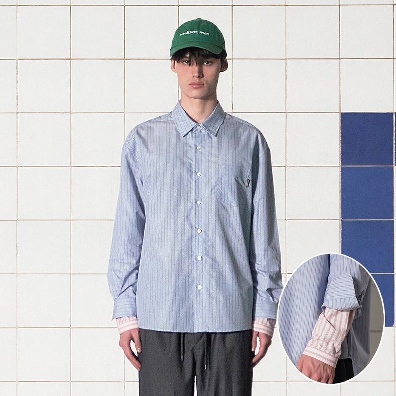 UNALLOYED（アナロイド）の「LAYERED CUFFS STRIPE SHIRT / BLUE（Tops）」
