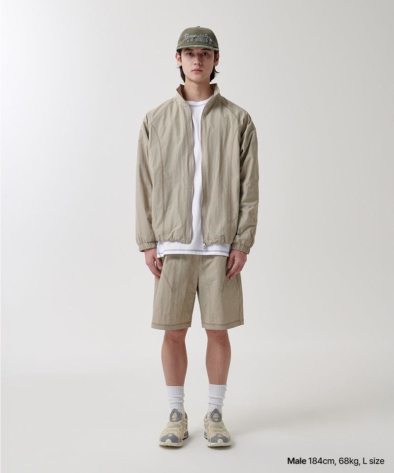COVER STITCH NYLON TRACK JACKET