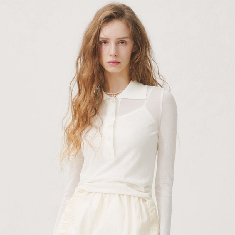 EVMOIU(エブモウ)の「SHEER LONG SLEEVED POLO - IVORY(Tops)」