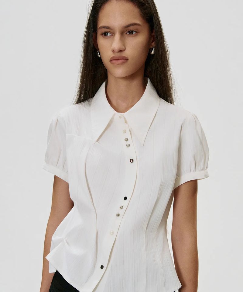 KIMZISU（キムジス）の「DOZI - Puffed Button Up Shirt _ OFF WHITE（Tops）」